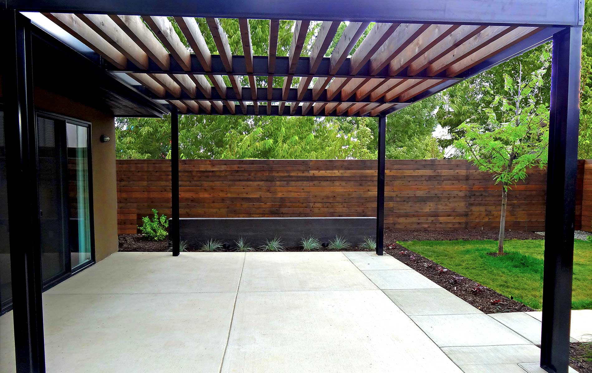 Steel Arbor  meets Concrete  Water Feature by Mile High 